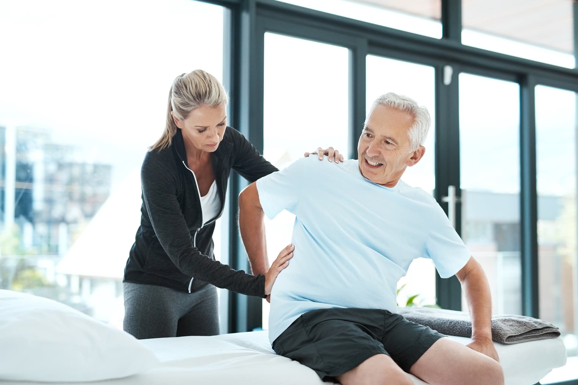 Chiropractor adjusting a patient